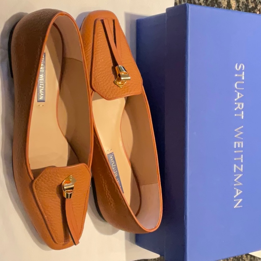 Womens Tan pebblegrain Stuart Weitman flats.
